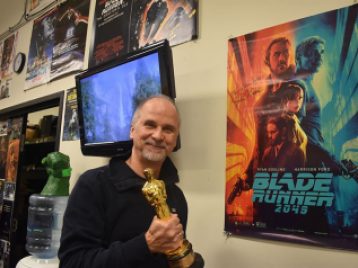 John Nelson poses with the poster for his 2018 Oscar Winner for Visual Effects, Blade Runner 2049.